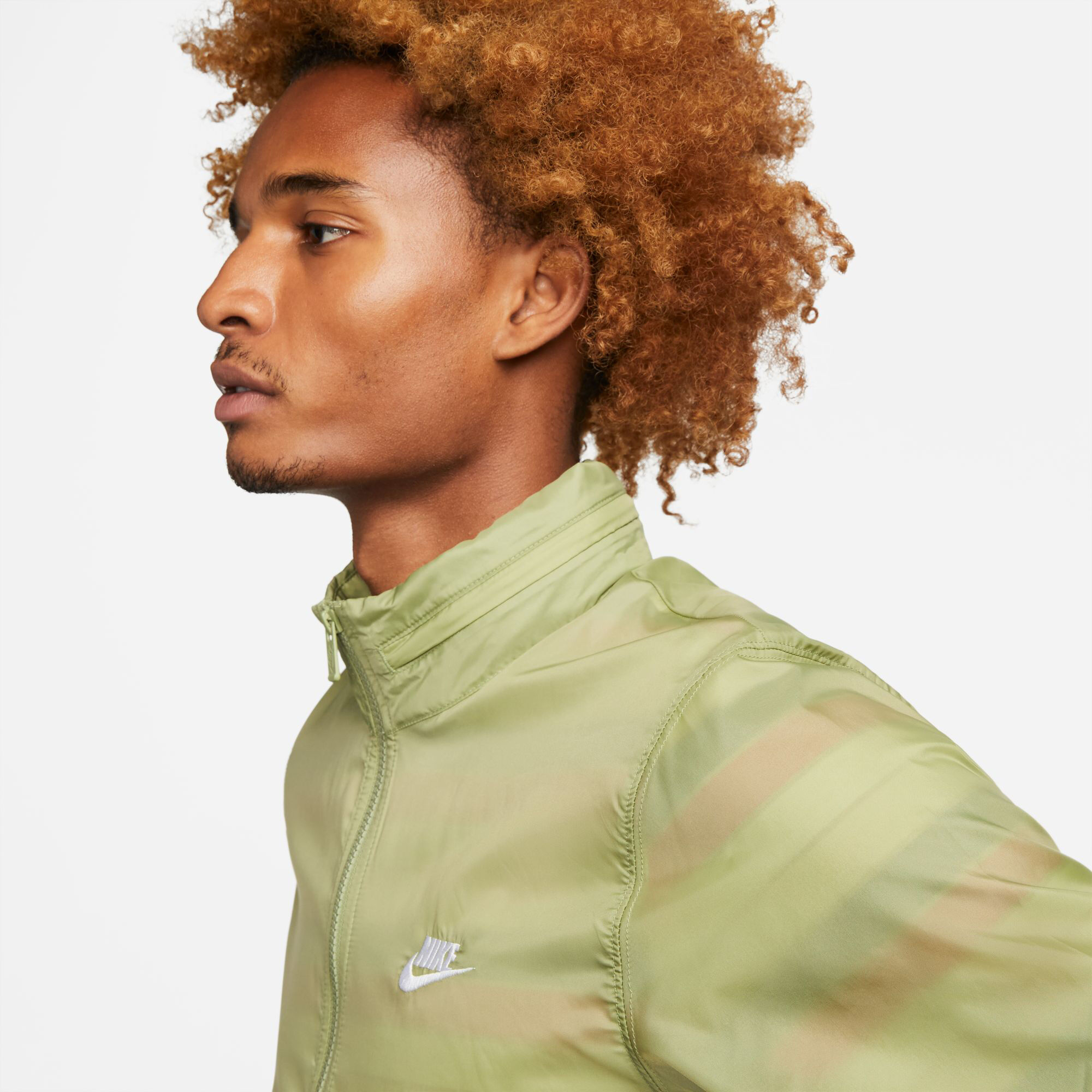 Nike woven tracksuit green sales