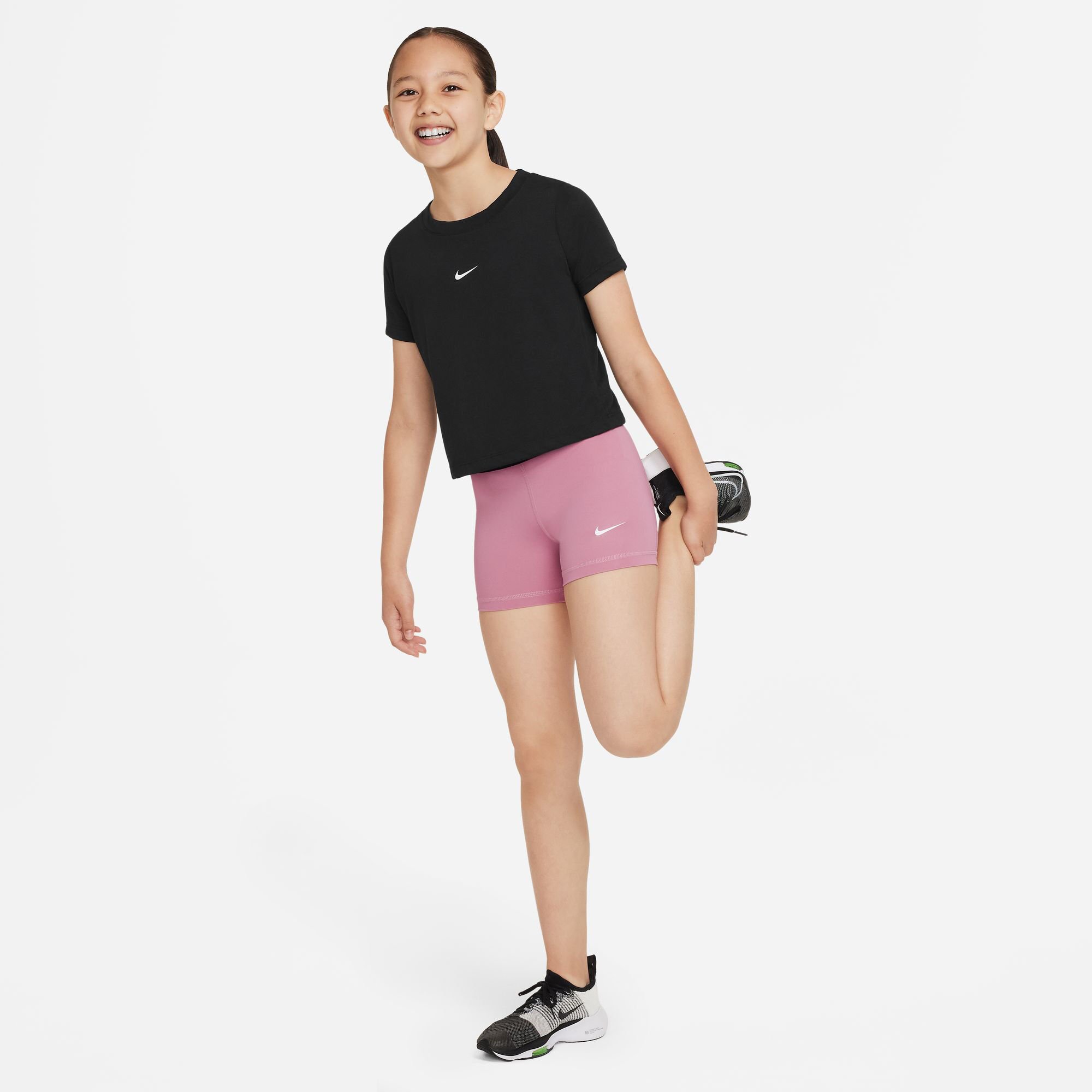 A girl wearing nike shorts shop