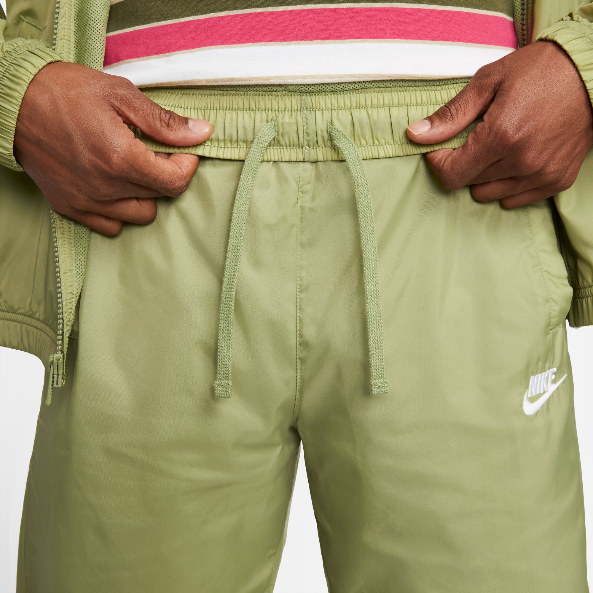 Nike woven tracksuit green new arrivals