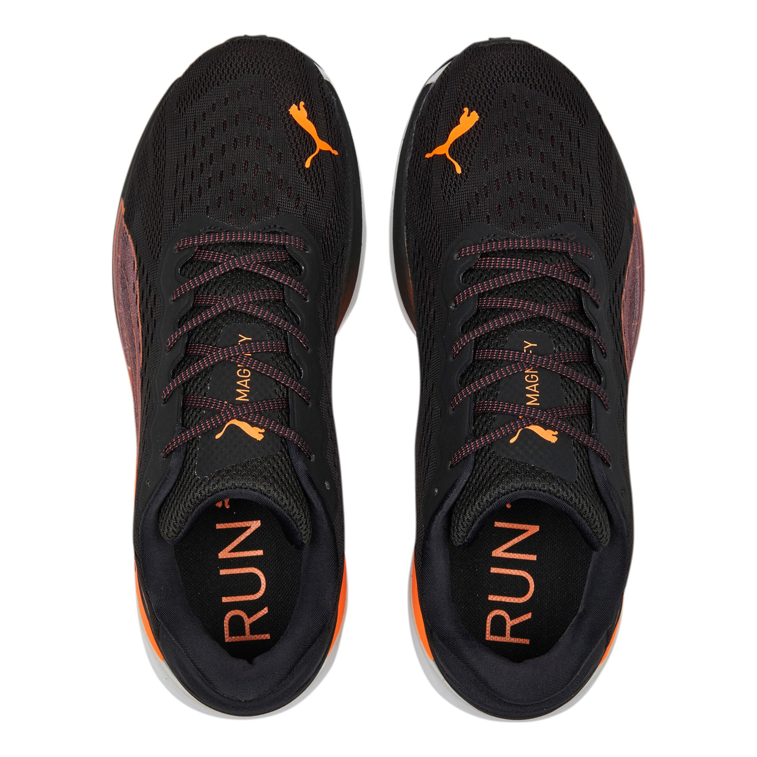 Black and orange running shoes top
